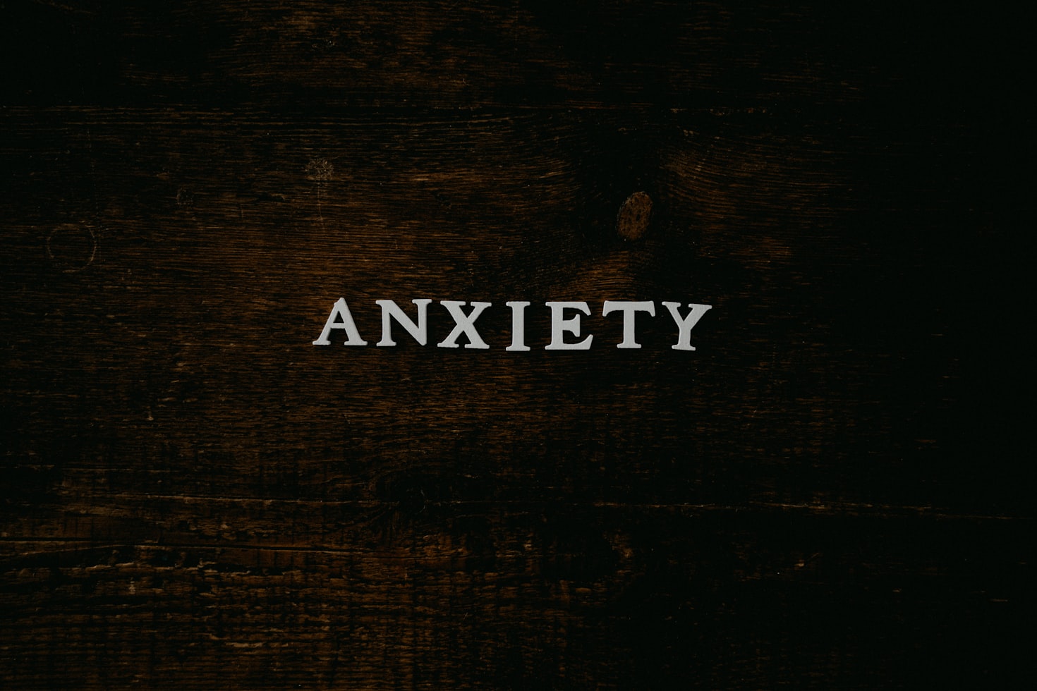 Person with anxiety looking at printed paper