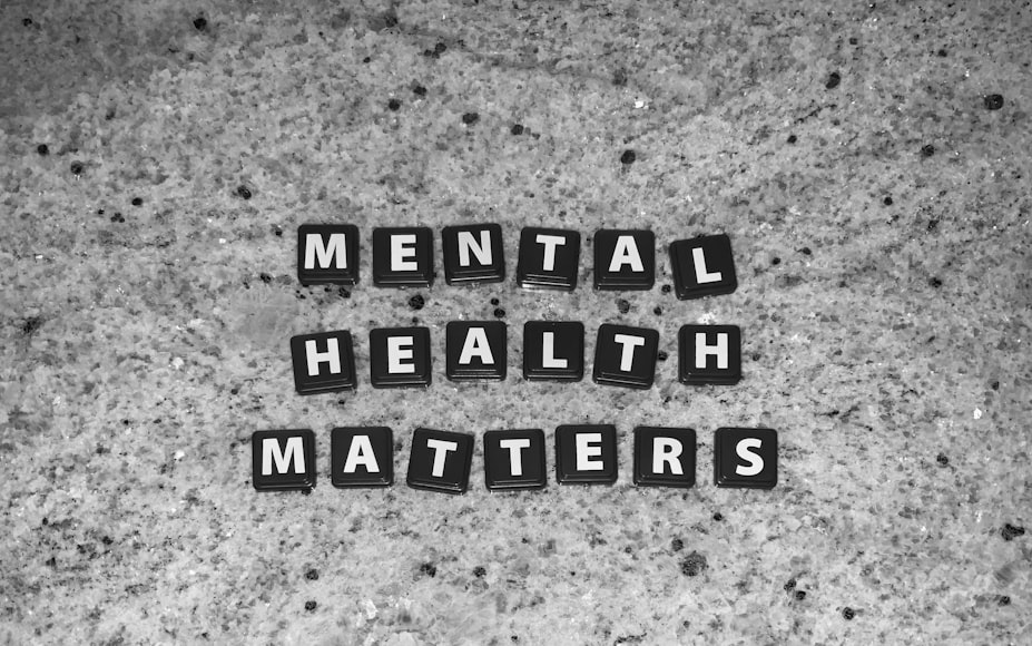 Person holding mental health awareness symbol representing mental health matters