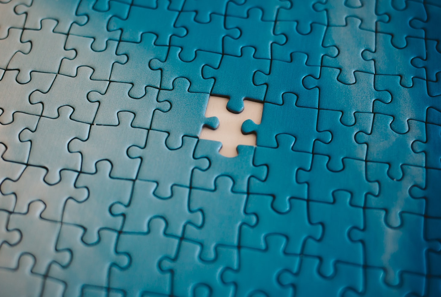 Puzzle board with a missing piece